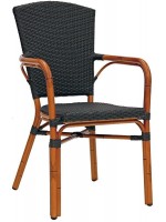 FREDERIK stackable armchair in rattan outdoor garden terraces hotel bar restaurant chalet