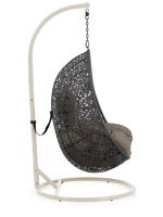 JARI suspended armchair in woven rattan with steel frame and and cushions included for indoor or outdoor