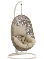 CULT suspended armchair in woven rattan with steel frame and and cushions included for indoor or outdoor