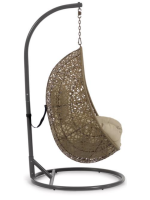 SOLO suspended armchair in woven rattan with steel frame and and cushions included for indoor or outdoor